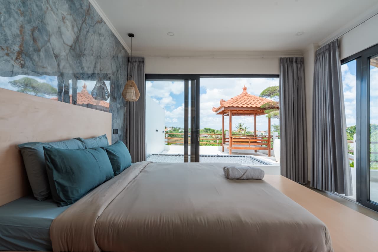 Bedroom opening to the rooftop terrace at Villa Ikigai